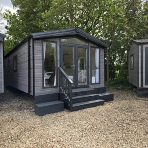 AVAILABLE | 2026 | NEW Sunrise Micro Lodge | 31×12 | 1 King bed