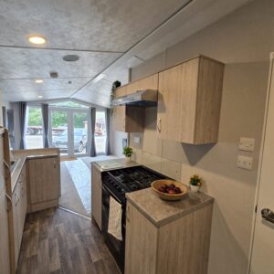 AVAILABLE | 2026 | Sunrise ‘Micro’ Lodge | 31×12 | 1 King Bed