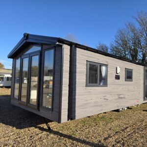 AVAILABLE | 2026 | Sunrise ‘Micro’ Lodge | 31×12 | 1 King Bed